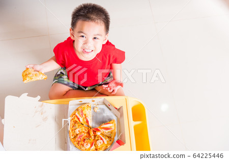 Top view of Cute Little Child eating Delivery Top view of Cute Little Child eating Delivery 64225446