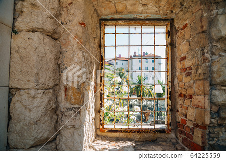 Riva street view through fortress window in Split, Croatia 64225559
