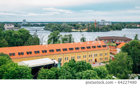 Spandau Citadel medieval fortress and river in Berlin, Germany 64227480