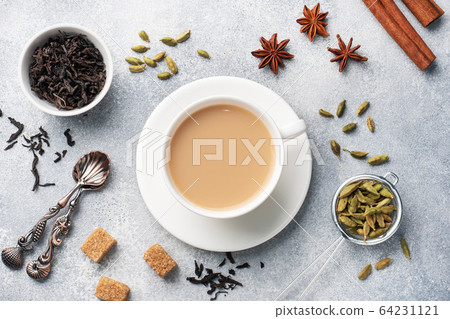Indian drink masala tea with milk and spices. Indian drink masala tea with milk and spices. 64231121