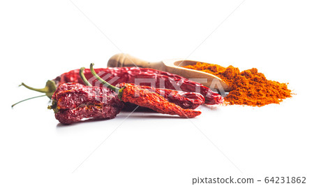 Dried red chili peppers and chili powder Dried red chili peppers and chili powder 64231862