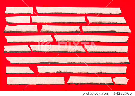 close up of an adhesive tape on red background 64232760