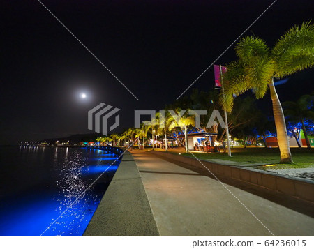 By the sea in Cairns 64236015