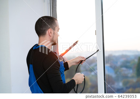 Professional master at repair and installation of 64239353