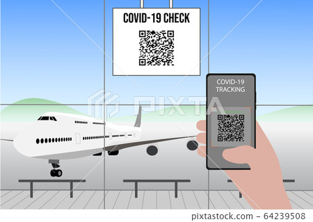 Hand using smartphone to scan Covid-19 check QR code in an airport hall 64239508