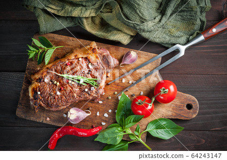 Beef steaks rib eye fried on grille 64243147