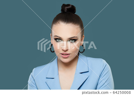 Beautiful fashion woman brunette on blue Beautiful fashion woman brunette on blue 64250008