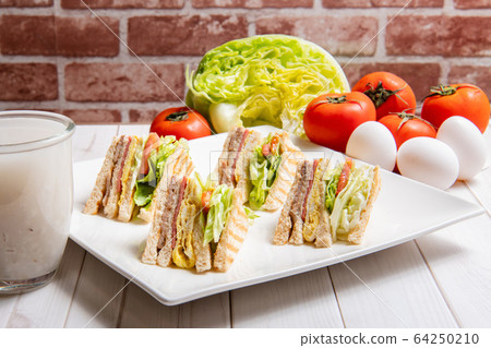 Breakfast, sandwiches, burgers, pancakes, eggs, vegetables, coffee, dining table Breakfast, sandwiches, burgers, pancakes, eggs, vegetables, coffee, dining table 64250210