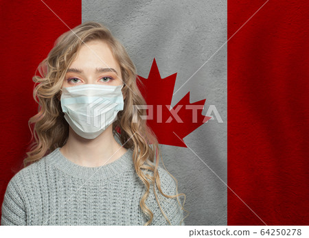 Young woman wearing a face mask with national flag 64250278