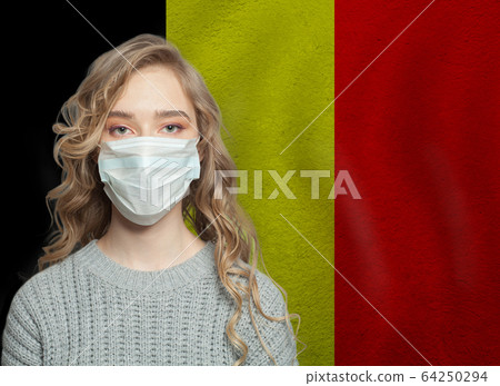 Young woman wearing a face mask with national flag 64250294