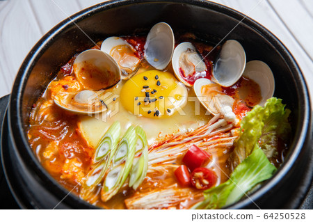 Korean food, bibimbap, toppogi, chajangmyeon, stone-roasted bibimbap Korean food, bibimbap, toppogi, chajangmyeon, stone-roasted bibimbap 64250528