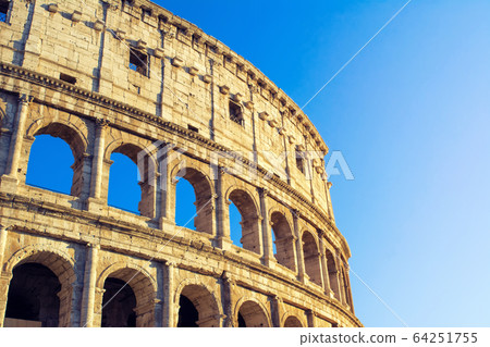 Colosseum at blue sky in Rome, Italy, Europe. Colosseum at blue sky in Rome, Italy, Europe. 64251755