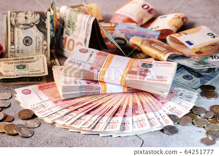 Large stack of banknotes, Russian rubles laying on Large stack of banknotes, Russian rubles laying on 64251777