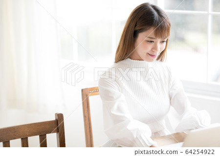 Woman working from home 64254922