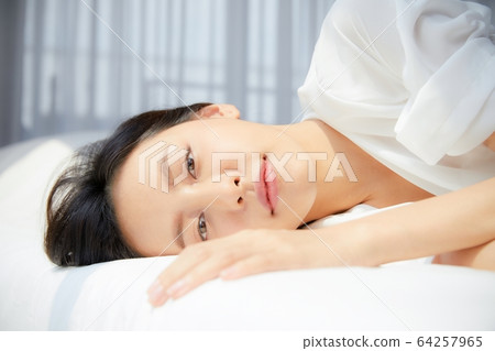Beautiful woman bed bed bedroom sleep bright room relax person material Beautiful woman bed bed bedroom sleep bright room relax person material 64257965