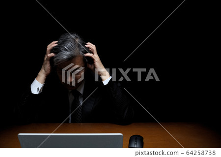 A man with a tragic feeling Black back suit figure executive president officer bureaucrat 64258738