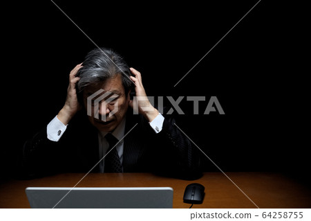 A man with a tragic feeling Black back suit figure executive president officer bureaucrat A man with a tragic feeling Black back suit figure executive president officer bureaucrat 64258755