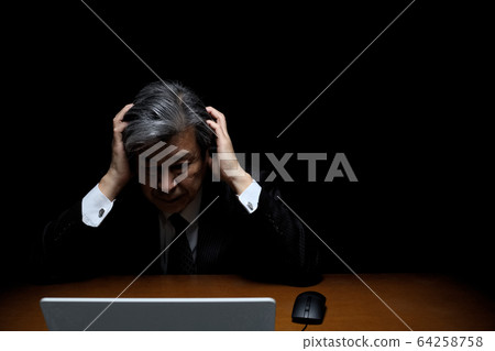 A man with a tragic feeling Black back suit figure executive president officer bureaucrat A man with a tragic feeling Black back suit figure executive president officer bureaucrat 64258758