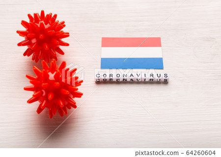 Abstract virus strain model of 2019-nCoV middle East respiratory syndrome coronavirus or coronavirus COVID-19 with text and flag Netherlands on white background. Virus pandemic protection concept. 64260604