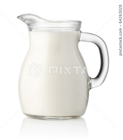 milk in glass jug 64263028