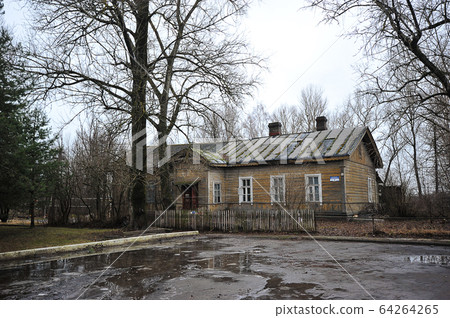 old wooden house on the station square in old wooden house on the station square in 64264265