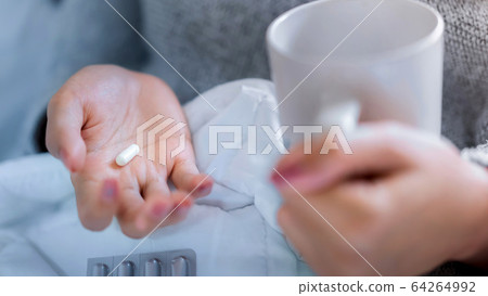Sick asian woman have hight fever flu and take Sick asian woman have hight fever flu and take 64264992