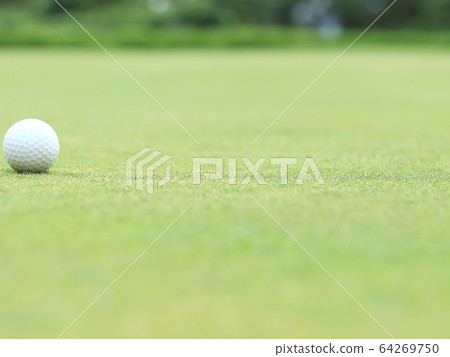 Golf ball image bokeh on green Golf ball image bokeh on green 64269750