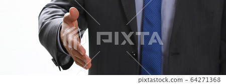 Man in suit and tie give hand as hello in office 64271368