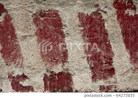 red stripes painted on the concrete as a warning 64273835