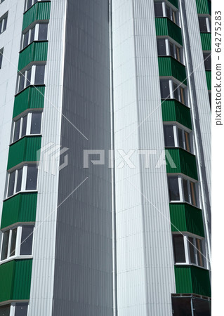 facade of a new multistory building with white and facade of a new multistory building with white and 64275283
