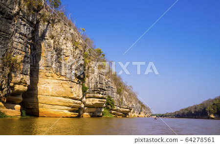 Impressive view of Manambolo river with spectacular stone formations reflected on the water, Tsingy de Bemaraha Strict Nature Reserve, Madagascar Impressive view of Manambolo river with spectacular stone formations reflected on the water, Tsingy de Bemaraha Strict Nature Reserve, Madagascar 64278561
