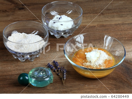 Homemade face mask from mango, heavy cream and Homemade face mask from mango, heavy cream and 64280449