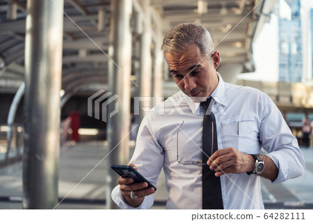 shock businessman read salary impacted by covid-19 shock businessman read salary impacted by covid-19 64282111