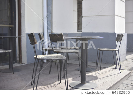 empty street cafe at the daytime in the central empty street cafe at the daytime in the central 64282900