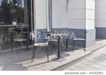 empty street cafe at the daytime in the central empty street cafe at the daytime in the central 64282901