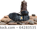 Pair of walking boots in the studio. 64283535