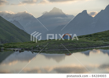 Tent in mountains Tent in mountains 64284003