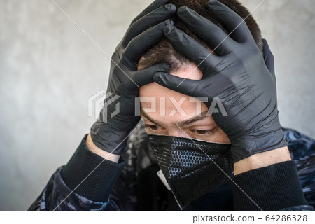 infected man has a headache and symptoms of the infected man has a headache and symptoms of the 64286328