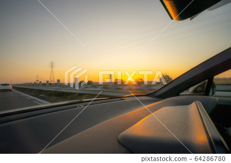 Early morning drive Driver's seat Sunrise Superb view Early morning drive Driver's seat Sunrise Superb view 64286780