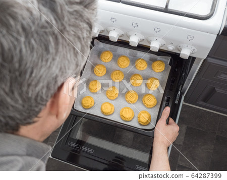Ramadan sweets. Preparation of Egyptian cookies 64287399