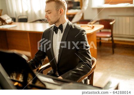 young pianist perform classical music 64288014