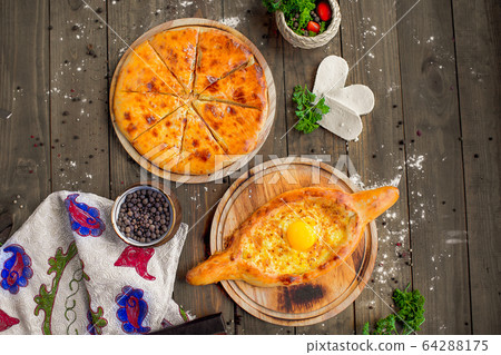 khachapuri po adzharski with khachapuri po imeretinski khachapuri po adzharski with khachapuri po imeretinski 64288175