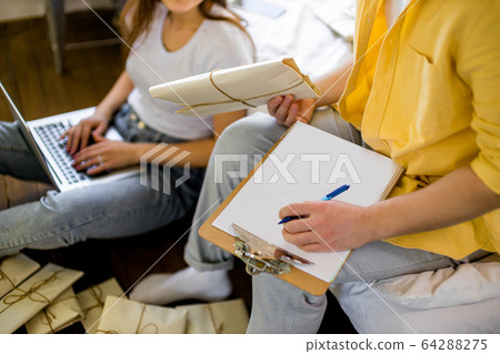 young caucasian couple business people with letters at home young caucasian couple business people with letters at home 64288275