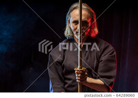 confident strong kendo warrior with shinai 64289060
