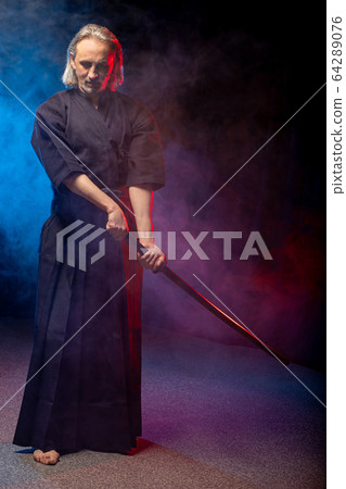 mature kendo fighter with shinai mature kendo fighter with shinai 64289076