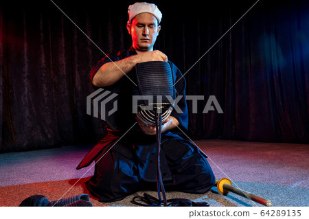 kendo fighter sit on the floor before fighting kendo fighter sit on the floor before fighting 64289135