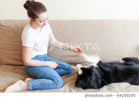 Stay Home Stay Safe. Smiling young attractive 64289295