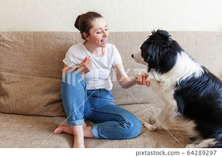 Stay Home Stay Safe. Smiling young attractive 64289297