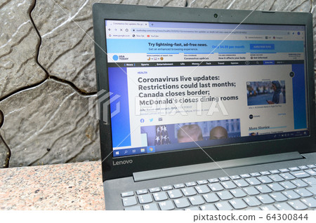 A computer screen page of an Online News Channel Showing Coronavirus 64300844