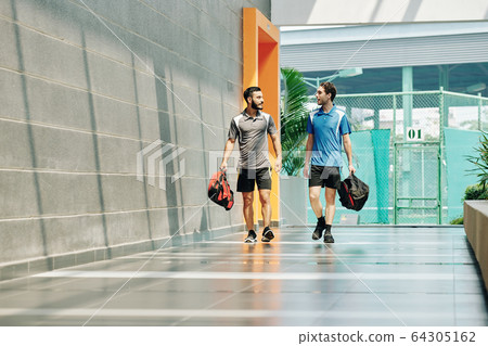 Sportsmen walking in health club 64305162